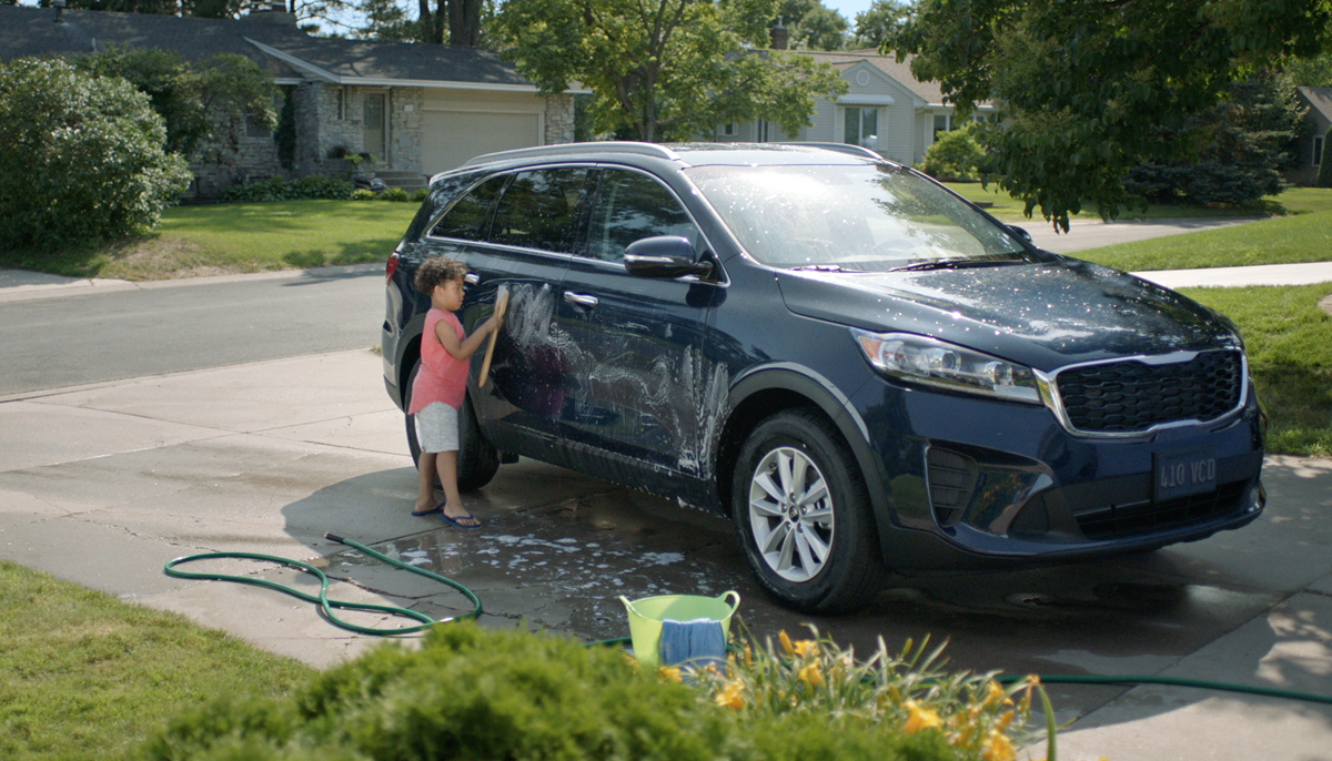 Child Washing Car